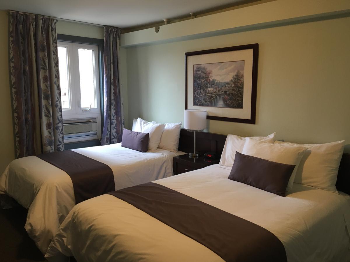 Auberge Centre Ville Saguenay Bagian luar foto