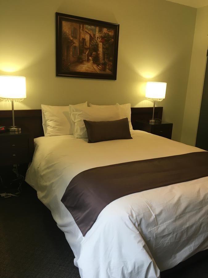 Auberge Centre Ville Saguenay Bagian luar foto